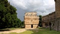 Small temple bearing many masks in the Nunnery complex, `the Church`, Chichen-Itza, Yucatan, Mexico Royalty Free Stock Photo