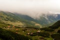 A small tent town in the mountains, tents by the lake in the mountains, the area near the lake Brebeneskul, the Carpathian Royalty Free Stock Photo