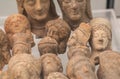 Small terracotte heads and female figures from 4th century BC. Found treasure with ancient objects of art, Italy