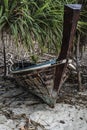 Small Thai fishing boat parked on a beach on Koh Lipe, Thailand