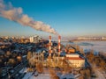 Small thermal power plant in Voronezh in winter evening, fuming pipes Royalty Free Stock Photo