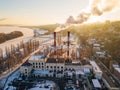 Small thermal power plant in Voronezh in winter evening, fuming pipes Royalty Free Stock Photo