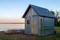 Small tin building for selling refreshments at a public beach on Ottertail Lake in Mi