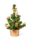 Small tiny artificial christmas tree with golden decorations
