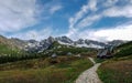 Small tiny wooden houses in Tatra mountains under the spring sun, Tatras, Poland Royalty Free Stock Photo