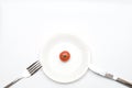 Small Tomato on plate