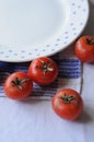 Small tomatoes on the table Royalty Free Stock Photo