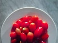 Small tomatoes in a white plate