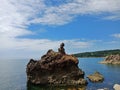 Small torii gate on stone in Sado island, Japan