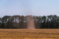 Small tornado or whirlwind with dust in a field