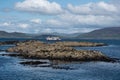 Small tour boat in distance on Tour in inner Hebrides