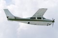 Small tourist plane flying in clouds Royalty Free Stock Photo