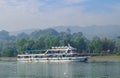 Small tourist ship with the passengers. Beautiful seascape with a tourist boat. The ferry just left the pier. Royalty Free Stock Photo