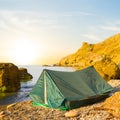 small touristic tent on a sea coast at the sunrise Royalty Free Stock Photo