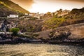 Small town on a cliff with sunset. Spanish village on a hill. Road trip on Tenerife, Canary Islands