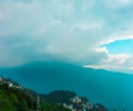 Small town at the edge of the mountain in Gangtok,sikkim,north India with clouds flying over in the sky Royalty Free Stock Photo