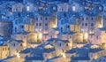 Small town in the evening illumination, vintage houses pattern panoramic background