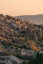 Small town on hill in Capadocia in a morning sunrise, central Anatolia region in summer season, Turkey Royalty Free Stock Photo