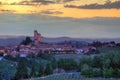 Small town on the hills at sunset in Italy. Royalty Free Stock Photo