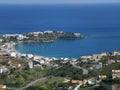 Small Town on the Shore of Vivid Blue Mediterranean Sea at Crete island