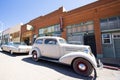 Small-town street with old cars Royalty Free Stock Photo