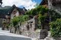 Sonogno small town in the swiss mountains. Street with old stone houses decorated with flowers. Royalty Free Stock Photo