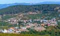 A small town under a tea hill valley in the morning in the highlands of Dalat, Vietnam