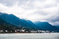 Small town at Yangtze river`s edge with mountain and cloud background Royalty Free Stock Photo