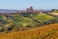 Small town and yellow vineyards in Piedmont, Italy. Royalty Free Stock Photo