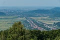 Small towns with pretty houses stretched at the foot of a huge mountain Royalty Free Stock Photo