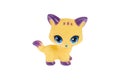 A small toy cat. On a white background, isolated Royalty Free Stock Photo