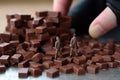 Small toy chocolatier making chocolates
