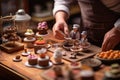 Small toy chocolatier making chocolates