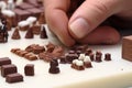 Small toy chocolatier making chocolates Royalty Free Stock Photo