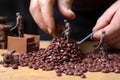 Small toy chocolatier making chocolates