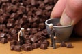 Small toy chocolatier making chocolates