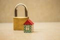 Small toy house and padlock