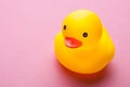 Small toy rubber duck isolated on pink Royalty Free Stock Photo