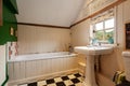 Small traditional bathroom within English Cottage home Royalty Free Stock Photo