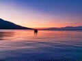 Small Fishing Boat in Corinthian Gulf Bay at Dawn, Greece Royalty Free Stock Photo