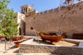 Small traditional wooden rowing boats - abras , with Al Fahidi Old Fort walls, Dubai. Royalty Free Stock Photo