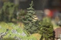 Small trees. Model of mountainous terrain and forests. Toy world