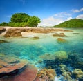 Small tropical island with a coral reef. Royalty Free Stock Photo