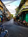 Small tropical road street with small tiny asian house building in warm Bangkok Thailand