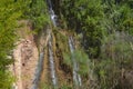 Small tropical waterfall. Green plants Royalty Free Stock Photo