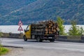 Small truck carrying wood - logs. Deforestation - concept Royalty Free Stock Photo