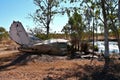 Small plane derelict among trees in outback Western Australia Royalty Free Stock Photo