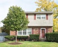 Small Two Story House with Front Crabapple Tree Royalty Free Stock Photo