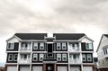 Small upmarket apartment block with balconies day light Royalty Free Stock Photo