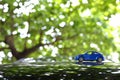 Small vehicle car toy driving travel road trip in nature Royalty Free Stock Photo